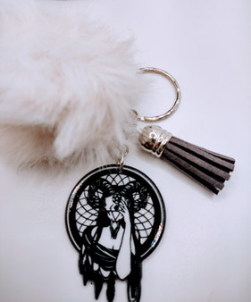 The Cernunnos lady keychain is an image of a female figure with horns. It's the perfect accessory for any fan of mythology and dark art