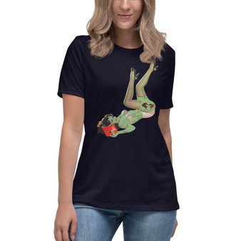 Embrace your inner bookworm with a touch of undead flair in the Reading a Book Pinup Zombie Women's Relaxed T-Shirt by Brat Style. This unique tee combines classic pinup aesthetics with a zombie twist, perfect for adding a touch of dark humor to your everyday wardrobe or making a statement at your next comic convention.