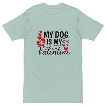 Unisex t-shirt shown flat featuring the phrase “My Dog Is My Valentine” with heart graphics. Clean, centered design with a soft Valentine color palette.
