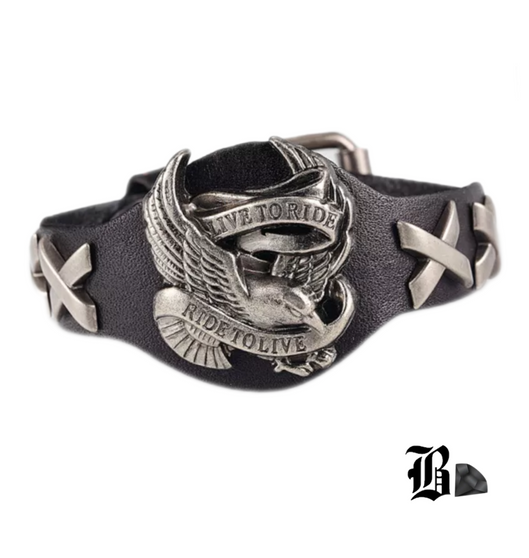 Introducing our stunning Unisex Faux Leather Cuff Style Bracelet with Buckle Closure, a perfect accessory for those who embrace the spirit of freedom and adventure. This unique bracelet features the majestic image of an eagle carrying a banner that proudly declares "Live to Ride, Ride to Live." Adding to its charm, the band of the bracelet is embellished with four steel X’s, symbolizing strength and endurance.