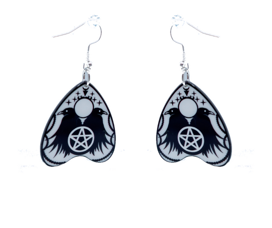 These Crow Ouija Board Style Earrings, dangle earrings are a fashion statement piece. These dangle earrings are made of quality acrylic and have a stainless-steel hook. These earrings are so charming. The perfect addition to any jewelry box. Perfect gift for a loved one or buy for yourself.