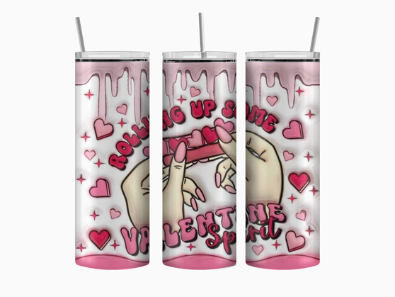 20oz skinny stainless steel tumbler shown upright with a seamless full-wrap design of hands rolling a joint. Valentine-inspired heart accents and playful typography reading “Rolling Up Some Valentine’s Spirit.” Glossy finish with clear sliding lid attached.