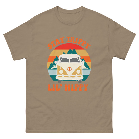 “Stay Trippy Lil Hippy unisex t-shirt featuring vintage van graphic and playful text on tan shirt, full view showing retro colors and boho hippie design, perfect for festival wear and free-spirit style.”