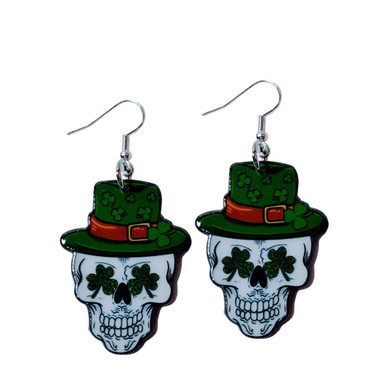 An assorted collection of St. Patrick’s Day-themed acrylic earrings featuring bold, edgy designs with skeletons, skulls, shamrocks, and leprechaun-inspired elements. Each pair showcases vibrant green accents paired with black and white detailing for a high-contrast, gothic-meets-festive aesthetic. Designs include skeleton hands, skull faces, clover details, and playful drinking motifs, all hanging from silver fishhook ear wires. This set blends dark humor, alternative style, and holiday spirit for a unique, statement-making accessory lineup.