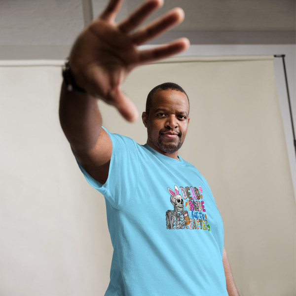 This comfortable and stylish tee is perfect for those who appreciate a touch of dark humor mixed with the pastel hues of spring.