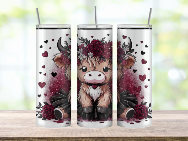 20oz stainless steel tumbler with a cute Valentine cow wearing a tutu. Full-wrap design features hearts, pastel Valentine colors, and whimsical accents. Glossy finish with clear lid attached.