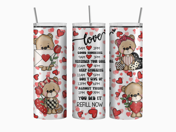 20oz skinny stainless steel tumbler shown upright with vertical hydration reminder prompts down the center. Cute Valentine teddy bears and heart accents surround the reminders in soft pastel colors. Glossy finish with clear sliding lid attached.