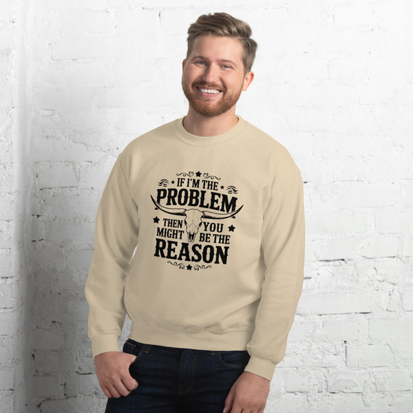 “If I’m the Problem You Might Be the Reason tan crew neck sweatshirt featuring bold sarcastic quote design, full view showing neutral color and statement graphic, perfect for humor lovers and edgy casual wear.”