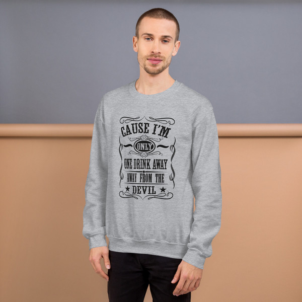 “One Drink Away From The Devil western humor crewneck sweatshirt featuring bold country-style typography, full view showing statement graphic design, perfect for country music lovers and outlaw-inspired fashion.”