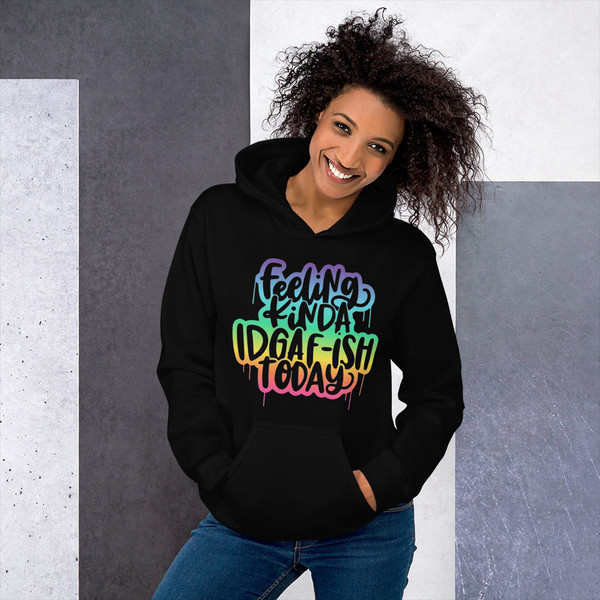 “Feeling Kinda IDGAF-ish Today black hoodie featuring colorful rainbow drip street-style lettering, full view showing bold statement graphic design, perfect for modern streetwear and attitude apparel.”
