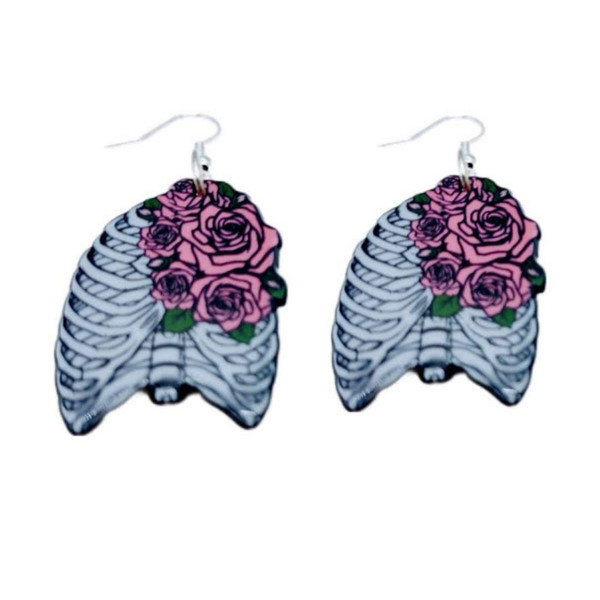 High-quality product images showcasing a pair of bold, gothic-inspired acrylic dangle earrings with a dark, edgy design, captured to highlight detail, size, and overall aesthetic against clean or styled backgrounds.