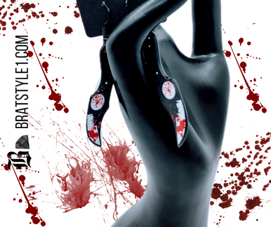 High-quality product images showcasing a pair of bold, gothic-inspired acrylic dangle earrings with a dark, edgy design, captured to highlight detail, size, and overall aesthetic against clean or styled backgrounds.