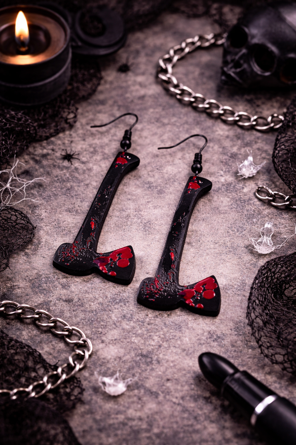 High-quality product images showcasing a pair of bold, gothic-inspired acrylic dangle earrings with a dark, edgy design, captured to highlight detail, size, and overall aesthetic against clean or styled backgrounds.