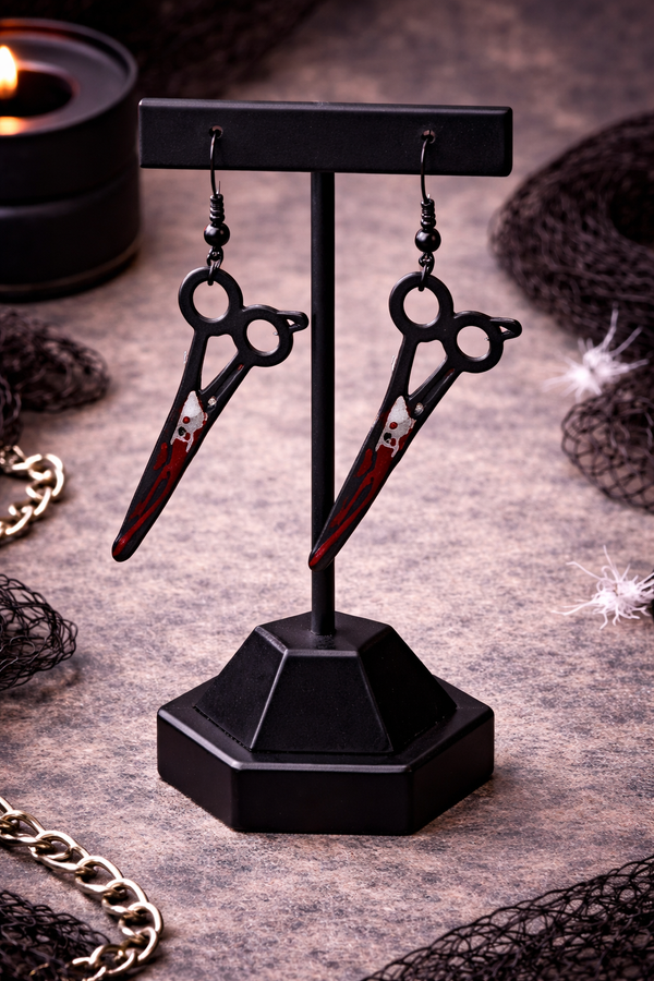 High-quality product images showcasing a pair of bold, gothic-inspired acrylic dangle earrings with a dark, edgy design, captured to highlight detail, size, and overall aesthetic against clean or styled backgrounds.