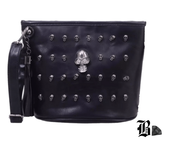 Main image: front-facing bag on pure white background
Secondary: back view showing zipper pocket
Lifestyle: worn crossbody on person (edgy outfit)
Detail: close-up of skull studs and texture