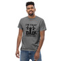 This classic unisex tee is the perfect way to celebrate fatherhood with comfort and style. Made from premium, breathable cotton, it offers a relaxed fit that's ideal for everyday wear. Whether you're running errands, grilling in the backyard, or simply relaxing at home, this tee will keep you feeling comfortable and looking your best. Show off your "Dad" status with pride and a touch of humor. This tee makes a great gift for yourself or any amazing dad in your life. This classic unisex tee is the perfect way to celebrate fatherhood with comfort and style. Made from premium, breathable cotton, it offers a relaxed fit that's ideal for everyday wear. Whether you're running errands, grilling in the backyard, or simply relaxing at home, this tee will keep you feeling comfortable and looking your best. Show off your "Dad" status with pride and a touch of humor. This tee makes a great gift for yourself or any amazing dad in your life.