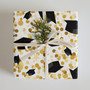 Make your graduation gifts stand out with our elegant Graduation Cap and Scroll Wrapping Paper. This high-quality wrapping paper is the perfect way to add a touch of sophistication and celebration to your graduation presents. Whether it's for a high school, college, or even kindergarten graduate, this design is sure to impress.