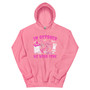 Hoodie featuring pink nurse-themed graphics with a nurse hat and the phrase “In October We Wear Pink.” Cozy, unisex, and Halloween-ready.