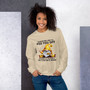 “Whatever I Did to Piss You Off funny gnome crewneck sweatshirt featuring yellow hat gnome with sunflowers on sand colored sweatshirt, full view showing sarcastic statement graphic design.”