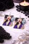 An assortment of edgy acrylic earrings featuring bold, rebellious designs including skeleton hands, sarcastic symbols, and attitude-driven graphics. Each pair showcases high-contrast detailing and expressive themes, styled against clean or minimal backgrounds to highlight their statement-making appeal.