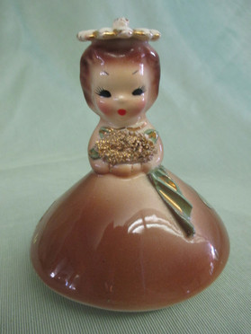 Little Miss November is charming..and is part of the "American Beauty Series" which in one of Muriel Joseph George's earliest series.