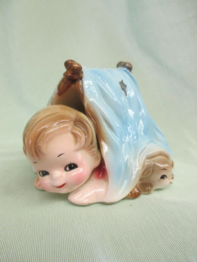 This darling piece is part of the "Happiness is...." series...