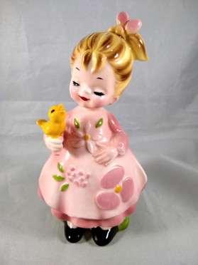 Girl in Pink Holding Chick