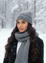 Cozy Alpaca Knit Scarf & Beanie Set, outside on a snowy day.