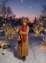 Model wearing women’s Suede & Baby Alpaca Shearling Mittens in outdoors in winter setting