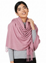 Armory Oversized Baby Alpaca Wrap in Primrose Pink on a woman, worn as a wrap