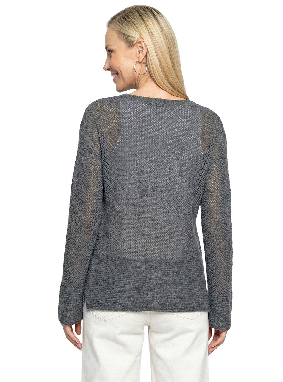 back view of woman wearing Airelle Openwork baby alpaca Sweater