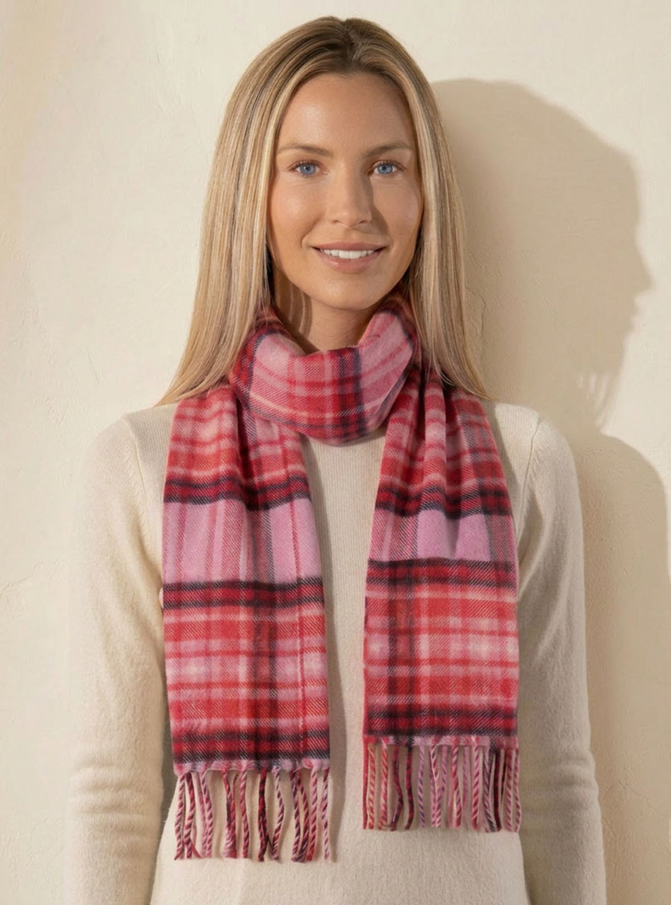 Brushed Baby Alpaca Tartan Scarf, Blush Noir, on woman. Classic holiday drama. Rich contrast — strong gifting colorway for fall and the Christmas season