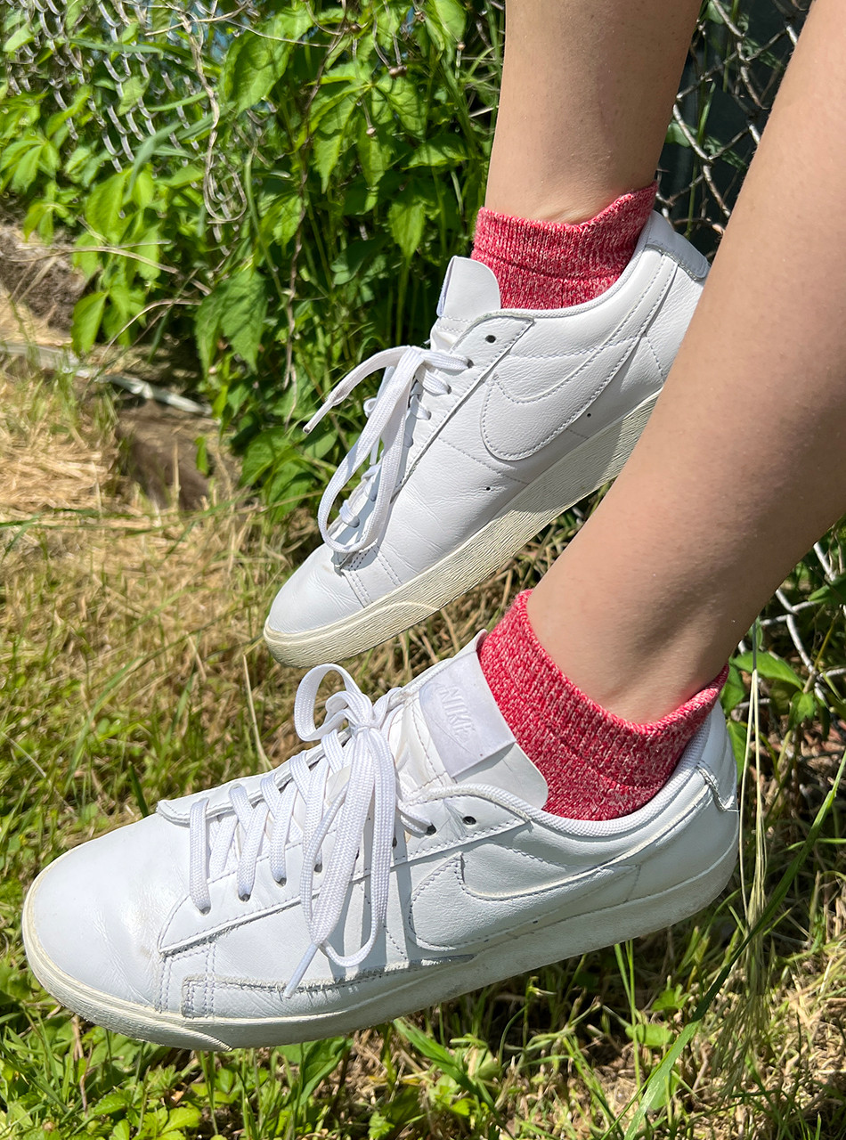 All-Purpose, All-Season Alpaca Tab Ankle Socks, Red on feet with tennis shoes.