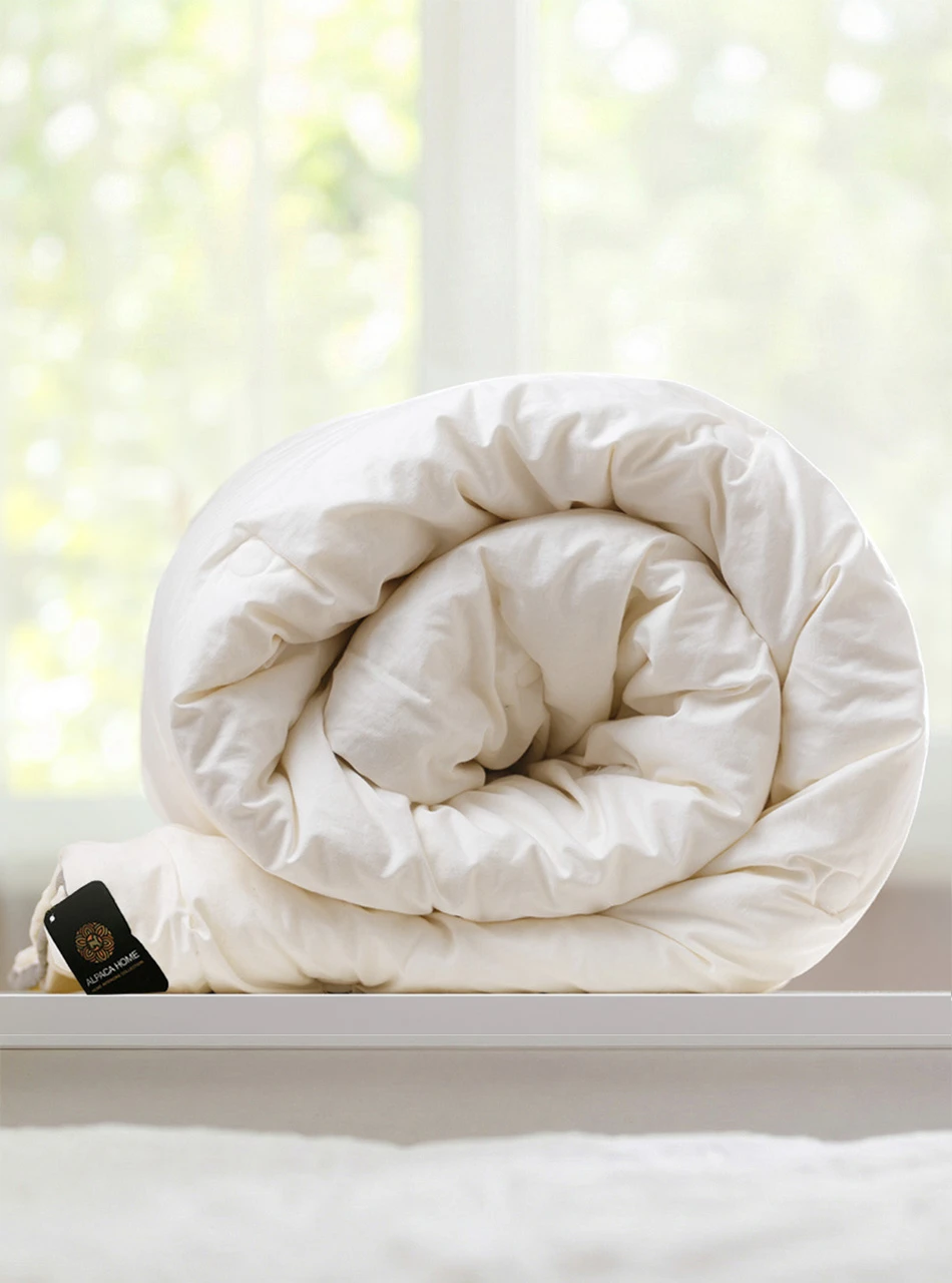 Alpaca Duvet - a Hypoallergenic Comforter Down Alternative by Alpaca Home
Rolled
