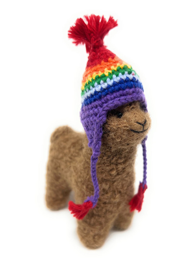 Needle Felted Alpaca Figurine with Rainbow Chullo Hat — 5" brown, main image.