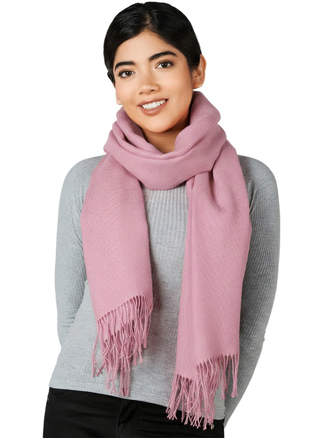 Armory Oversized Baby Alpaca Wrap in Primrose Pink on a woman, looped as a scarf
