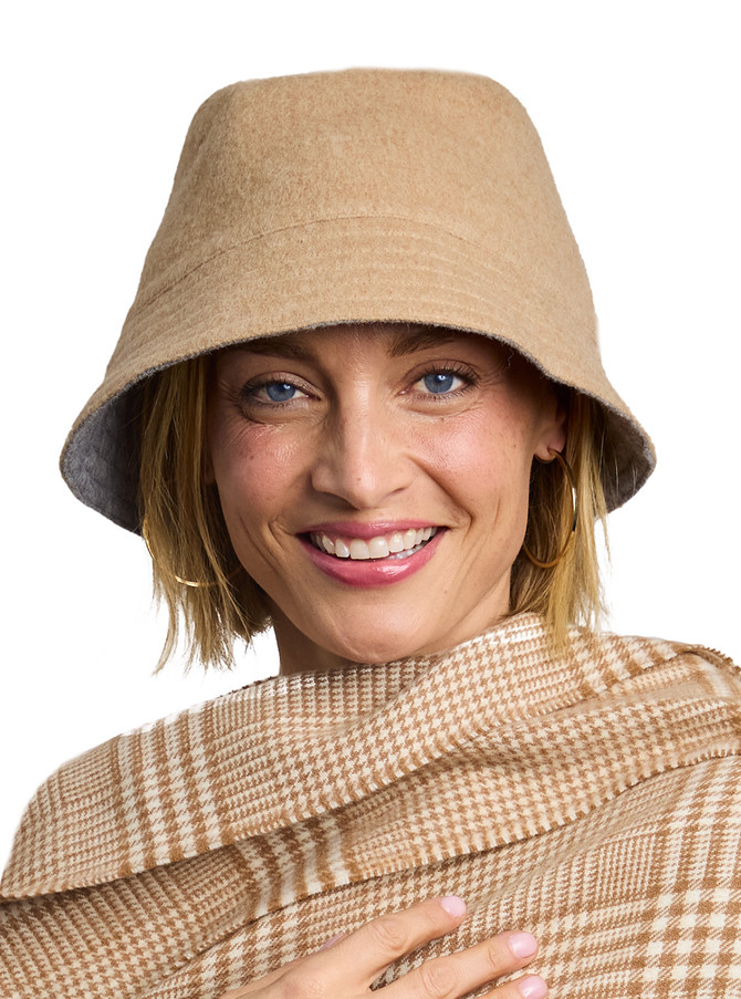 Model wearing reversible alpaca wool bucket hat main image