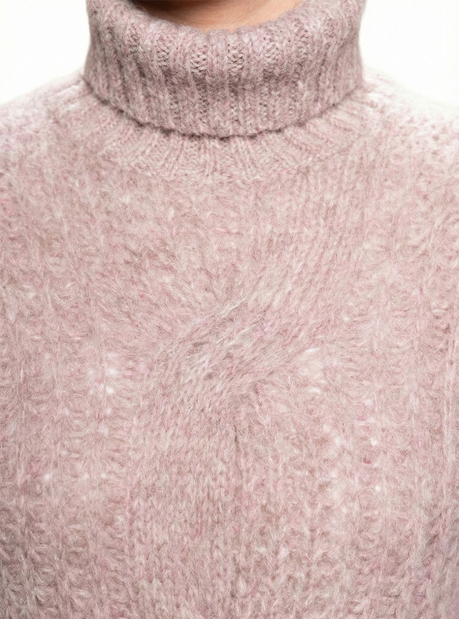 Close-up of soft-textured baby alpaca knit showing alpaca fiber and stitch definition