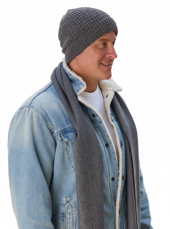 Waffle-knit baby alpaca beanie on man in studio.