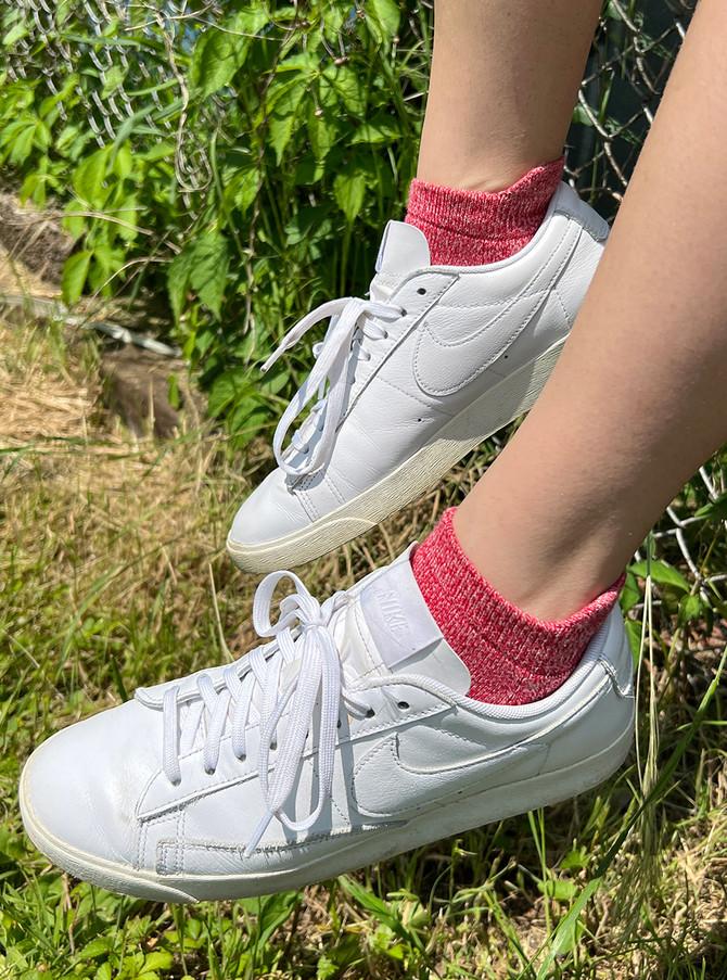 All-Purpose, All-Season Alpaca Tab Ankle Socks, Red on feet with tennis shoes.