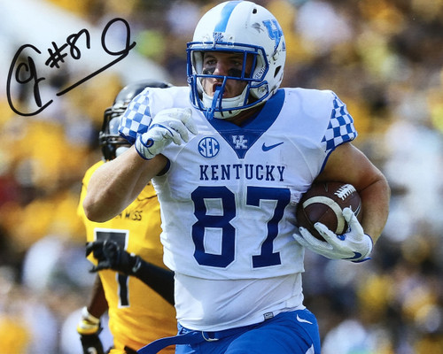 C.J. Conrad hand signed 8x10