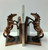 Rearing Horse Bookends 8"W x 9"H
Copper Plated and Resin Cast