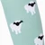 Close-up of the sheep jacquard pattern on mint green horse riding socks.