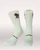 Free Rein horse riding socks in Mint green with a bay horse design