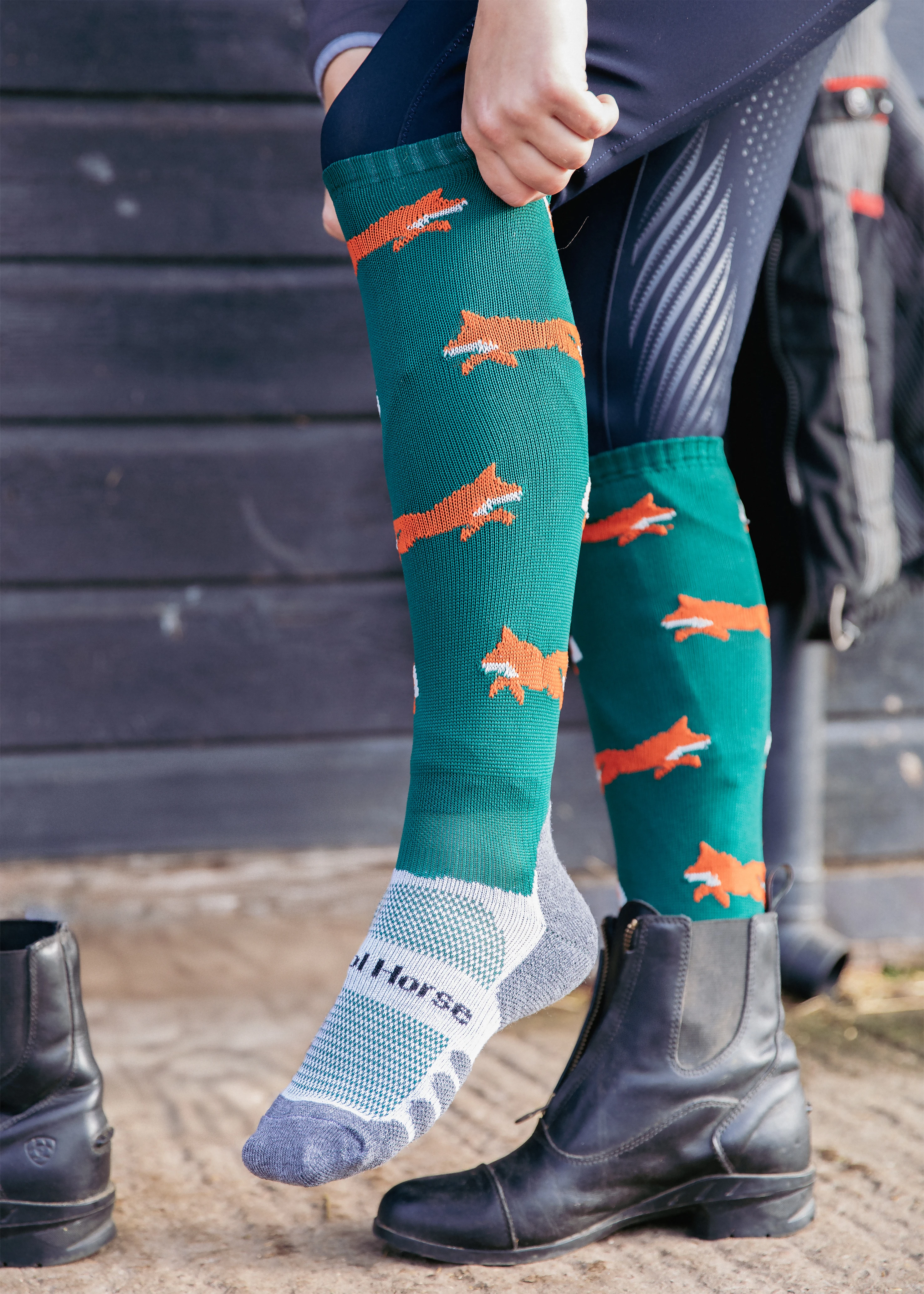 Mr Fox riding socks in green with orange foxes and a patterned performance foot