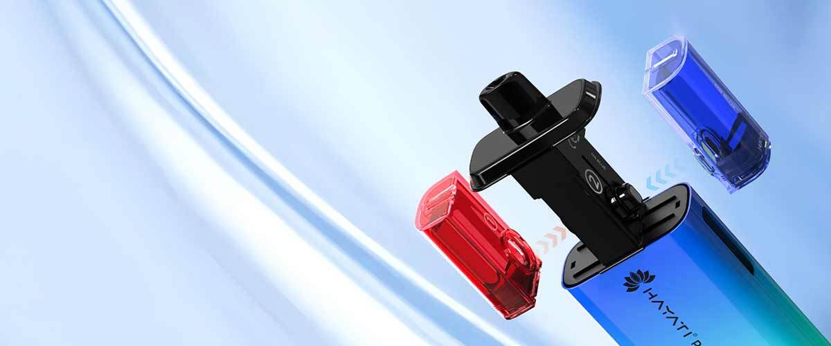 Close-up of the Hayati Pro Ultra Plus 25K vape with red and blue dual flavour pods showing the rotating connection design.