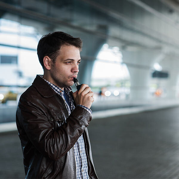 Man vaping at airport