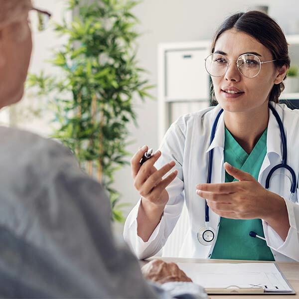 Female Doctor Talking to Patient