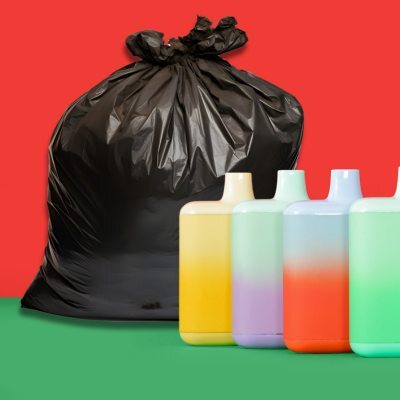Disposable Vapes Being Thrown In Bin Bag