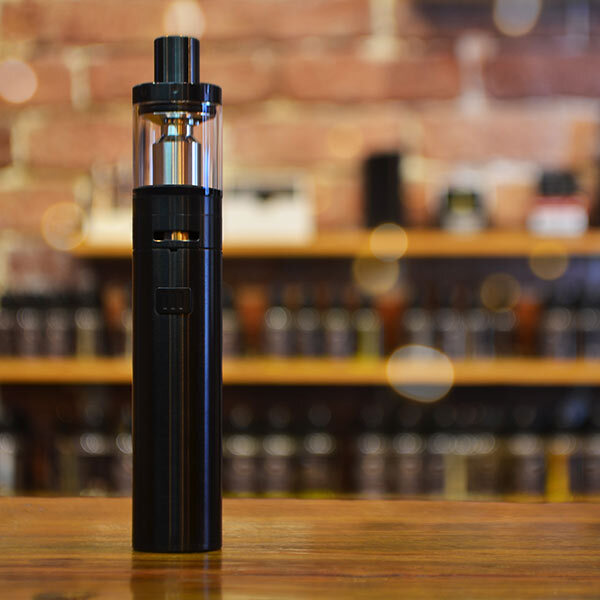 Vape standing up on desk.